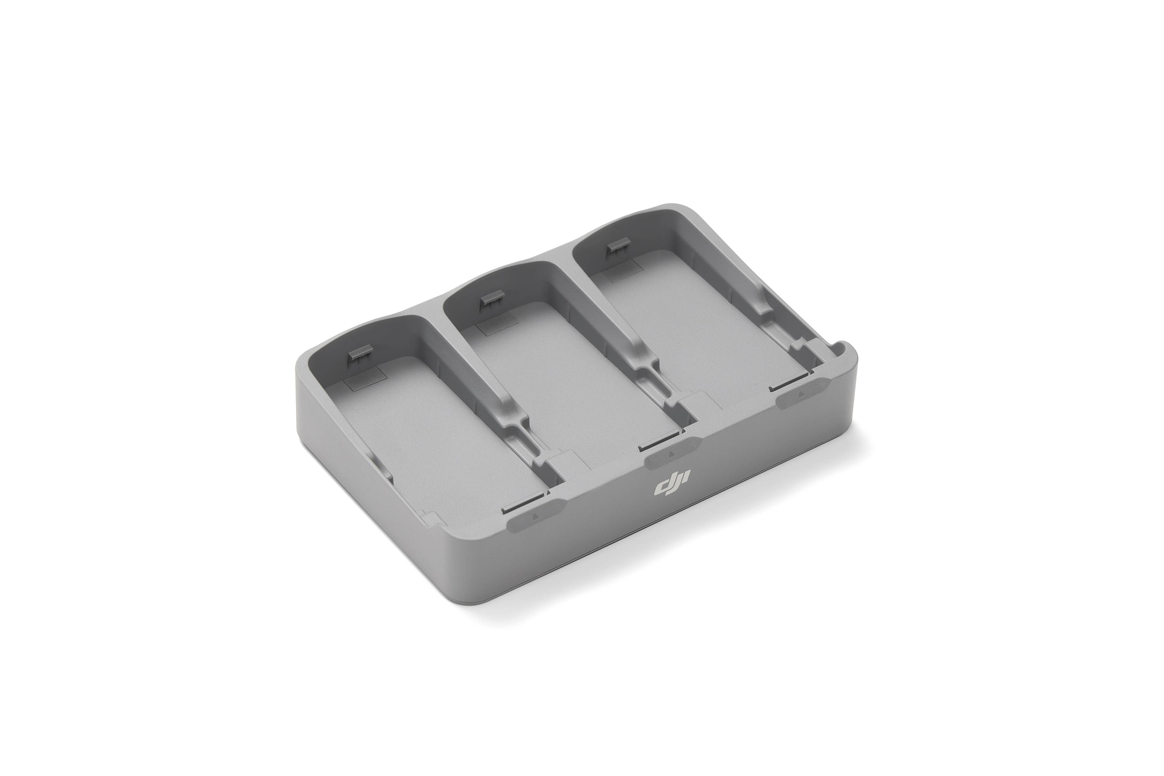 DJI Neo 2 Two-Way Charging Hub in Grau, mit Platz für mehrere Akkus zur gleichzeitigen Aufladung.