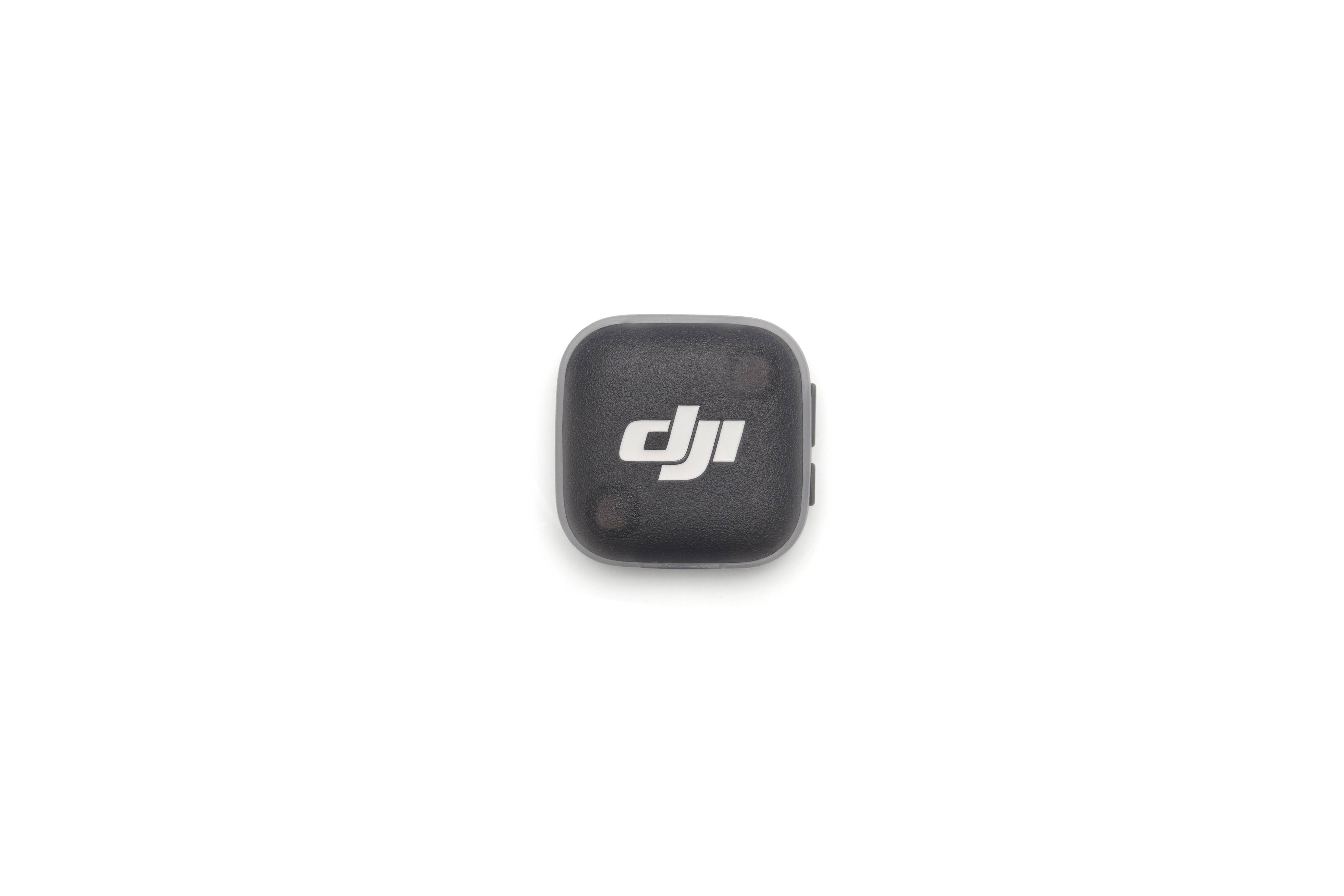 DJI Mic Mini 2 Transmitter: Kompakter, schwarzer Sender mit DJI-Logo für hochwertige Tonaufnahmen.