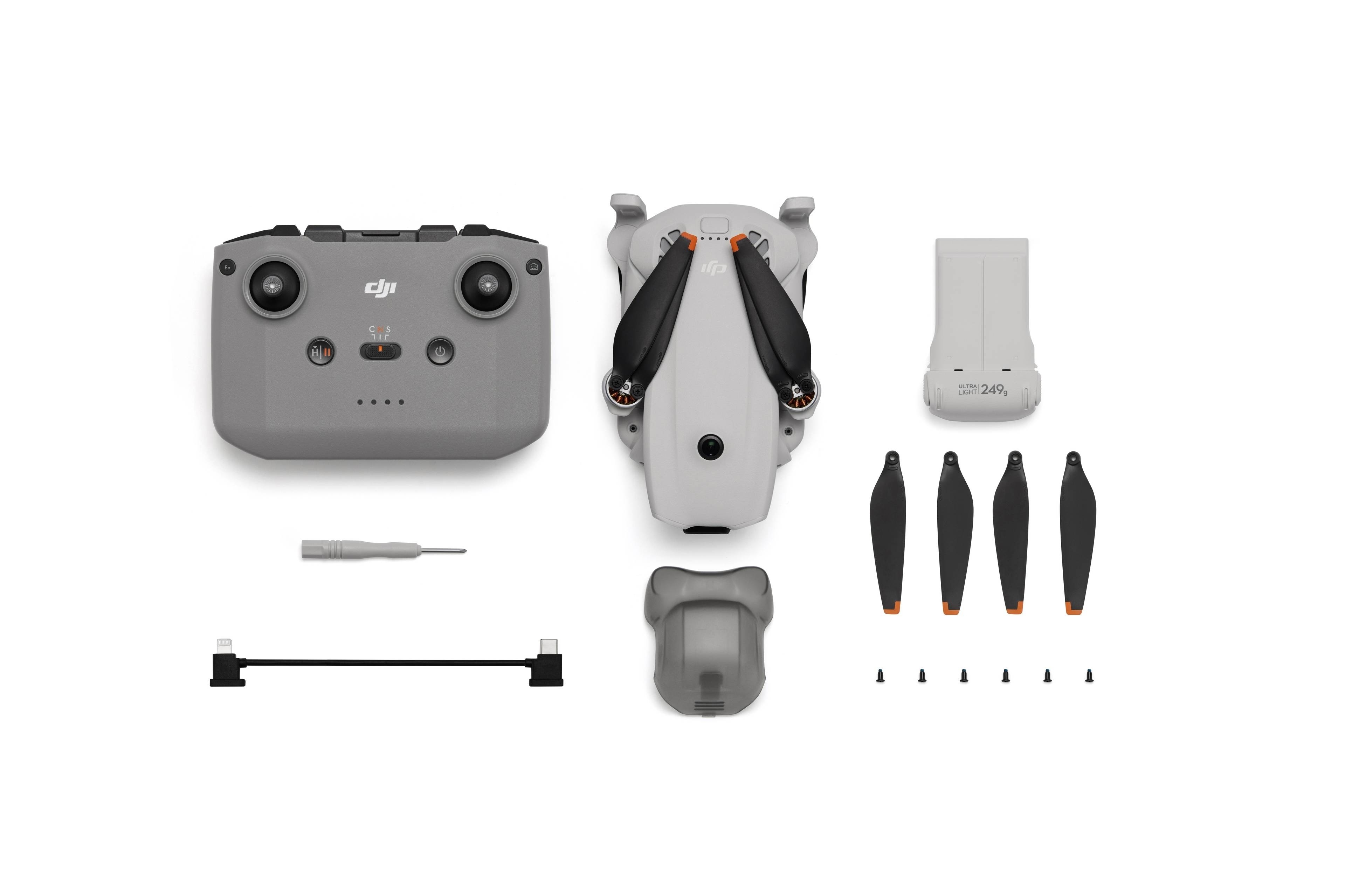 Lieferumfang des DJI Lito 1: Fernsteuerung, Drohne, Propeller, Werkzeuge und Zubehör.
